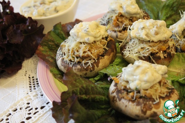 Mushrooms stuffed with kasha, mushroom sauce