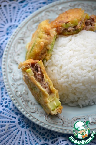 Stuffed zucchini with pork rice