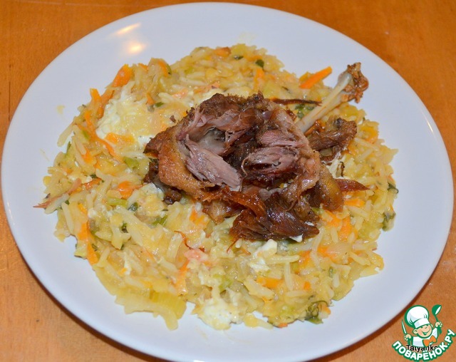 Duck confit with lentils and rice