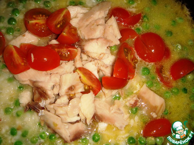 Risotto with green peas, cherry tomato and smoked eel