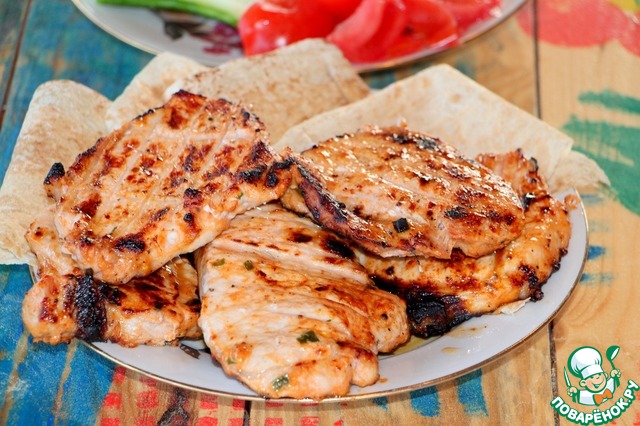 Pork escalope in a tomato-mustard marinade