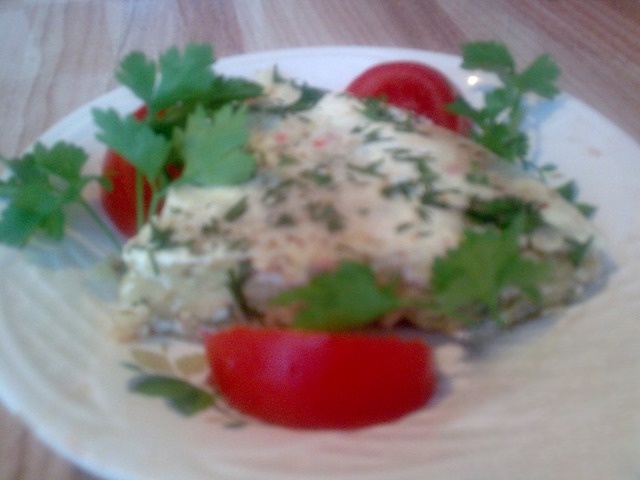 Casserole with potatoes and crab sticks