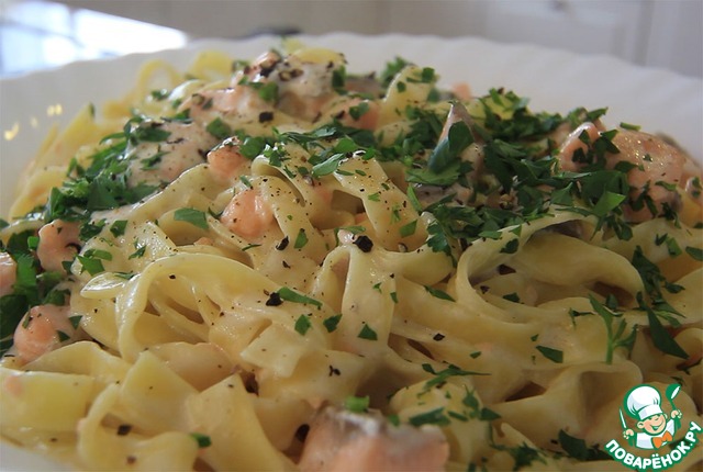 Pasta in cream sauce with salmon