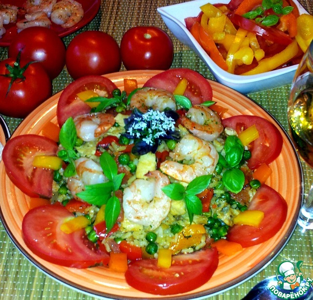 Paella with chicken and prawns