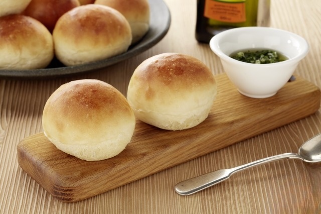 Homemade rolls with garlic sauce
