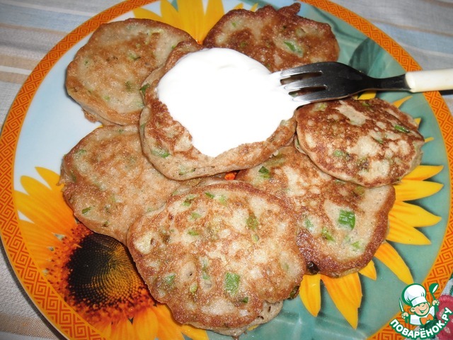 Pancakes made from rye flour with bran and green onions