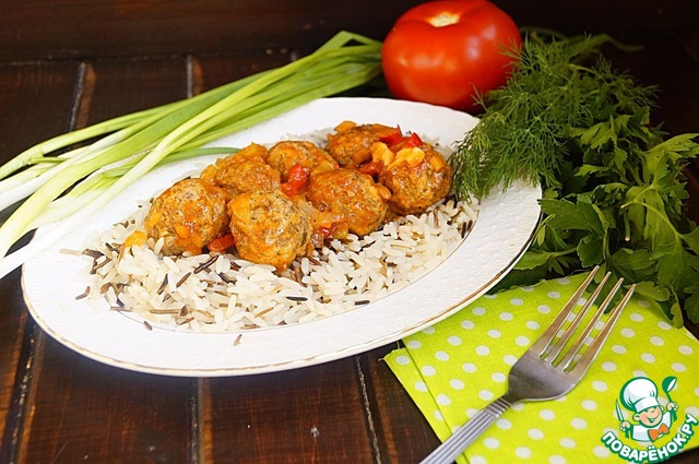 Meatballs in vegetable sauce with rice