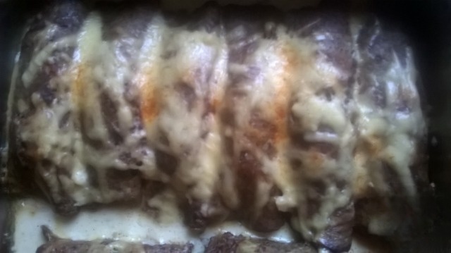 Hepatic pancakes with potatoes and sour cream sauce