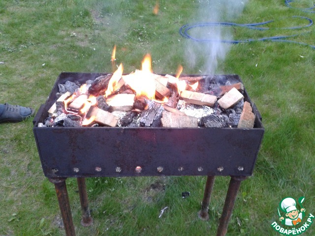 Meatballs with potatoes on the coals