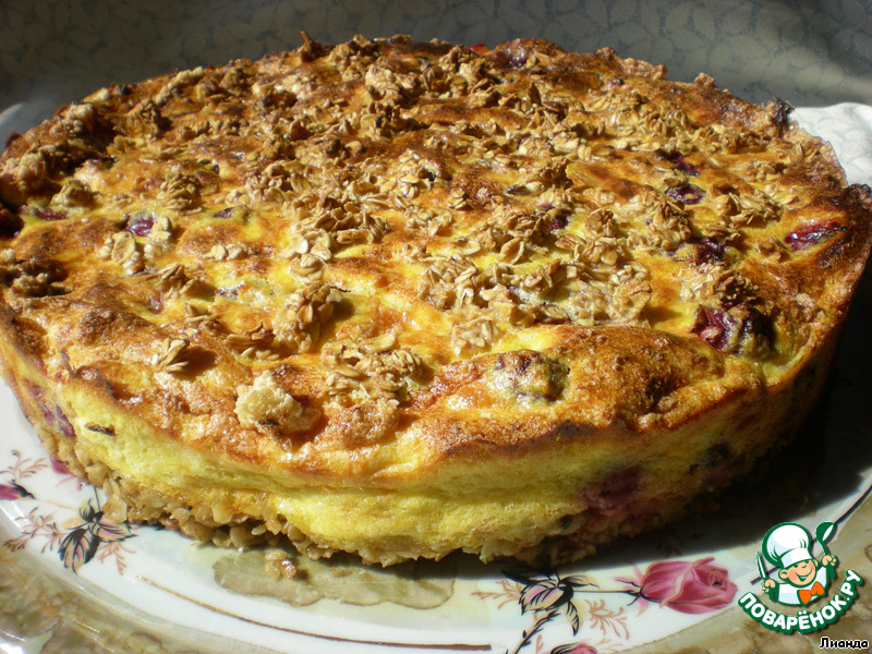 Cottage cheese baked pudding with oat flakes and cherries