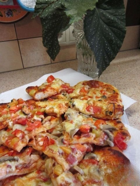 Pizza with mussels and pizza with meat