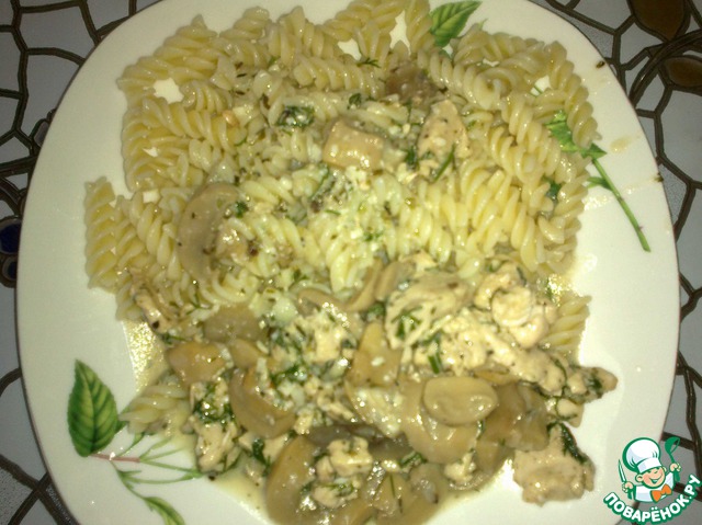 Chicken breast with mushrooms in a mild creamy sauce