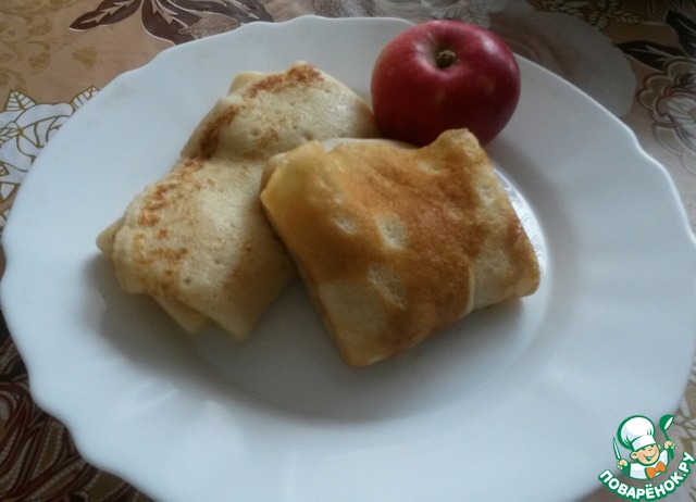 Pancakes on the boiling water with Apple and cinnamon filling