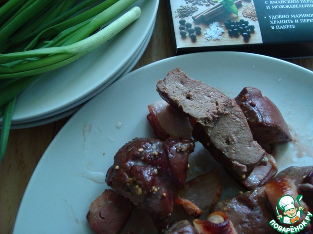 Skewers of beef liver with bacon