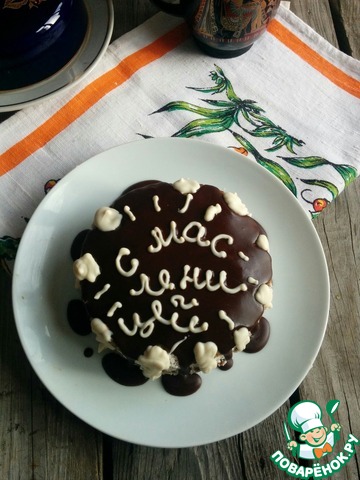 Chocolate pancake cake with prunes and cheese