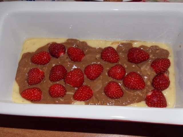 Muffin with cereal and strawberries