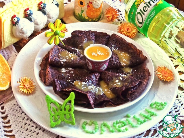 Chocolate pancakes with lemon sauce