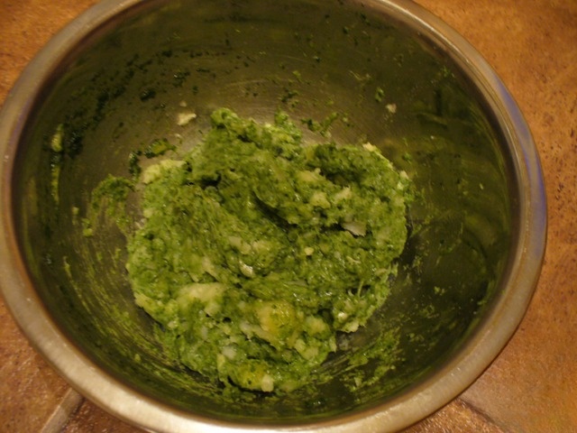 Baked potatoes with spinach and cheese