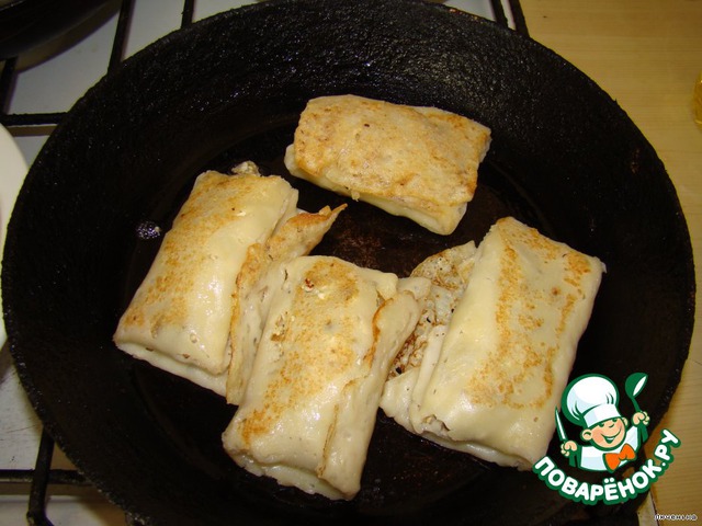 Pancakes stuffed with chicken liver and eggs with onions
