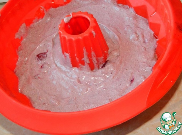 Festive cupcake with cherries and nuts