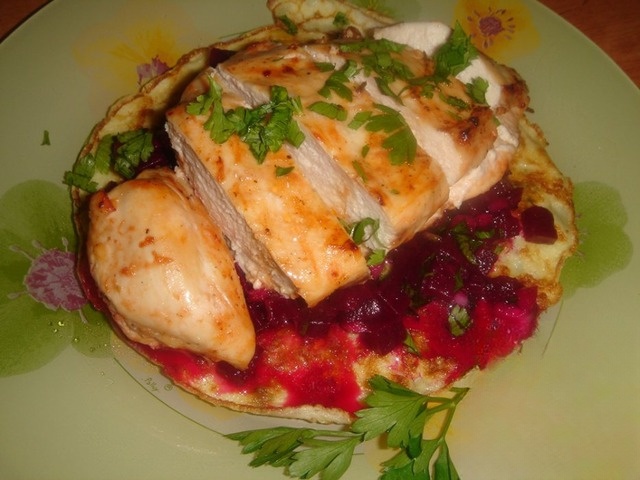 Chicken breast with corn polenta and beet garnish