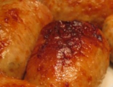 Chicken sausages with cheese in foil