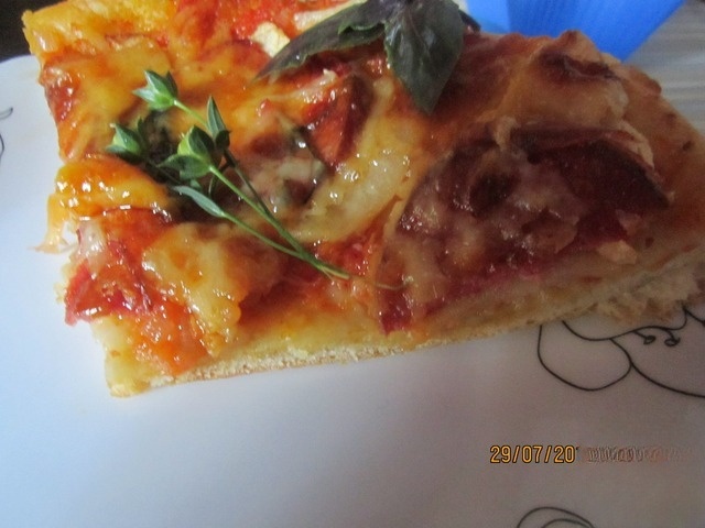 Apple pizza with salami