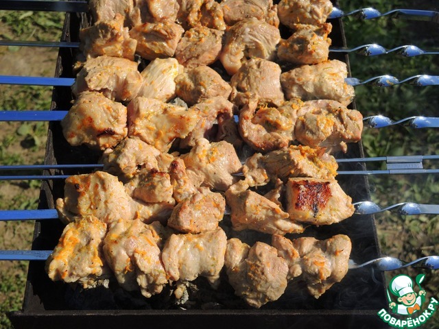 Skewers of pork neck in a citrus marinade