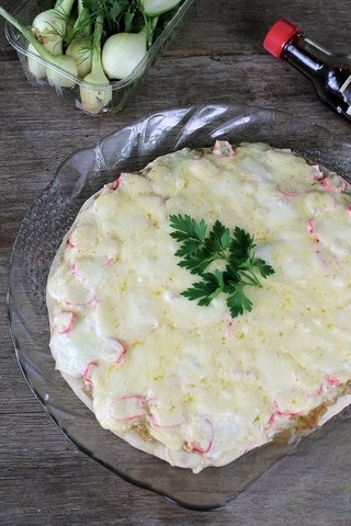 Pizza with zucchini and crab sticks