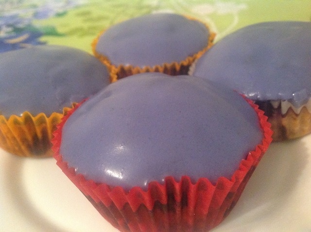 Muffins with blueberries and glaze