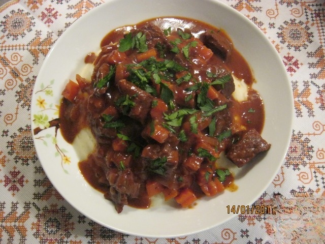 Meat in wine and tomato sauce
