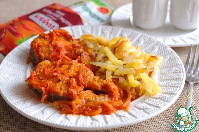 Pike in spicy vegetables with tomato