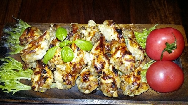 Chicken wings in sweet and sour marinade