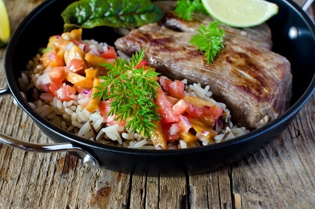 Beef with peach salsa and rice
