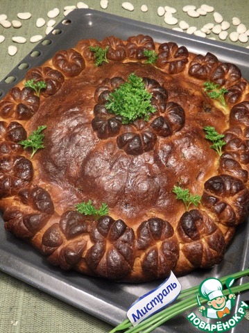 Pie with beans, meat and cabbage