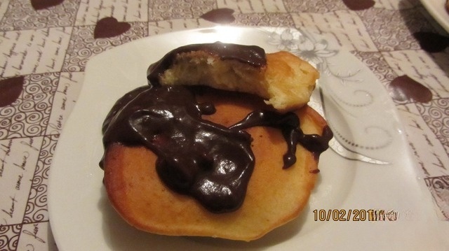 Pancakes with sour cream with chocolate sauce