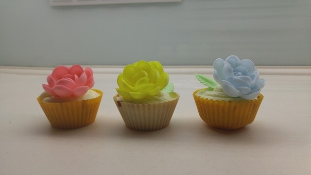 Delicate cupcakes with cream cheese frosting