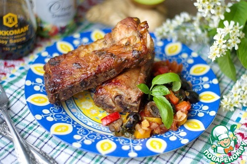 Pork ribs with a salad of olives