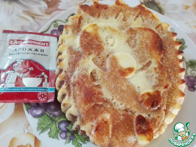 Pancake pie with dried apricots and cheese