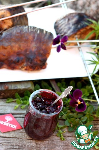 Blackcurrant sauce with herbs for fish