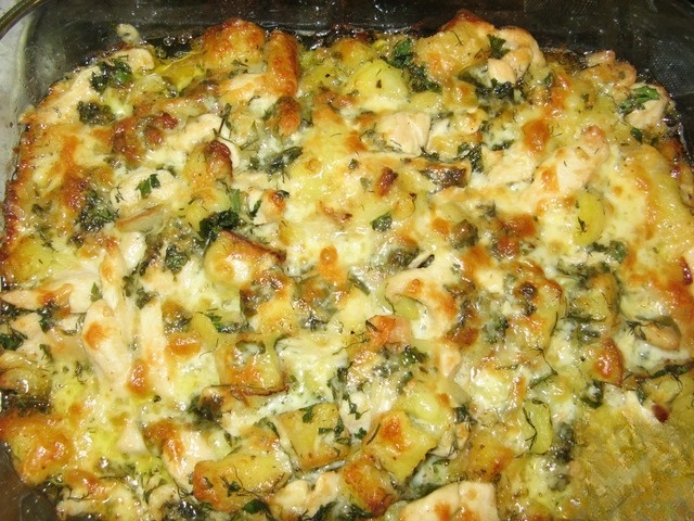 Baked pork with potatoes and chicken