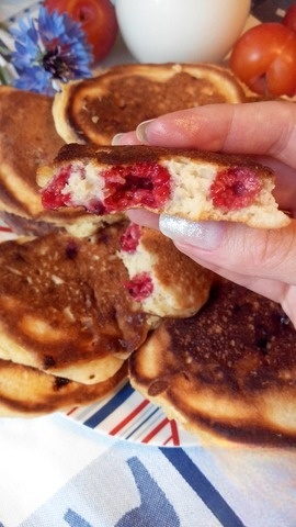 Pancakes with sea-buckthorn berries and raspberries