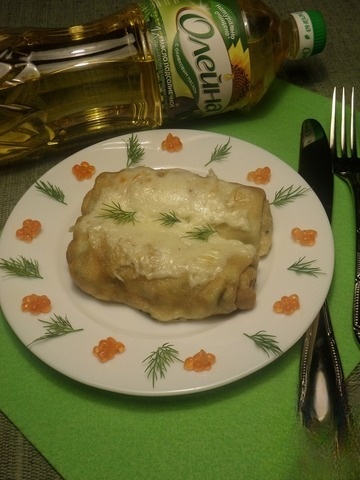 Pancakes with fish, greens and cheese