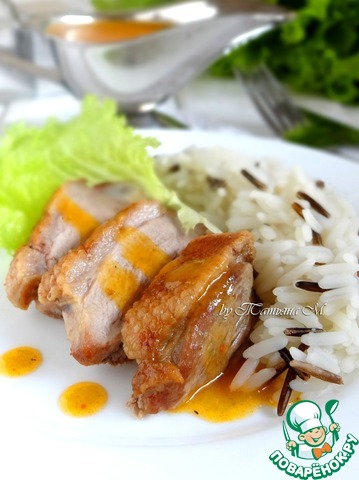 Duck breast with rice and spicy carrot sauce