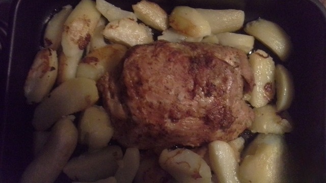 Pork with potatoes baked in the oven