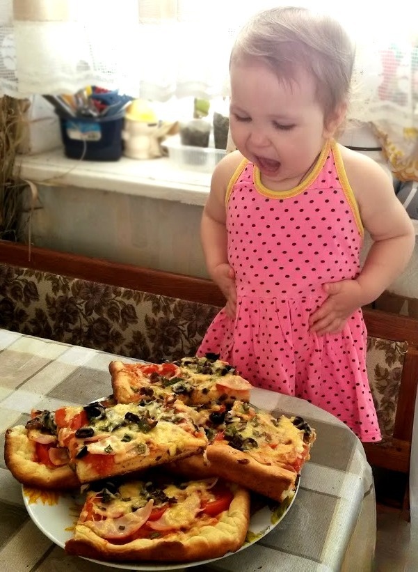 Pizza on a sumptuous cake