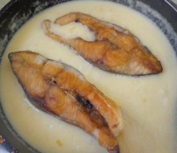 Carp stewed in orange sauce