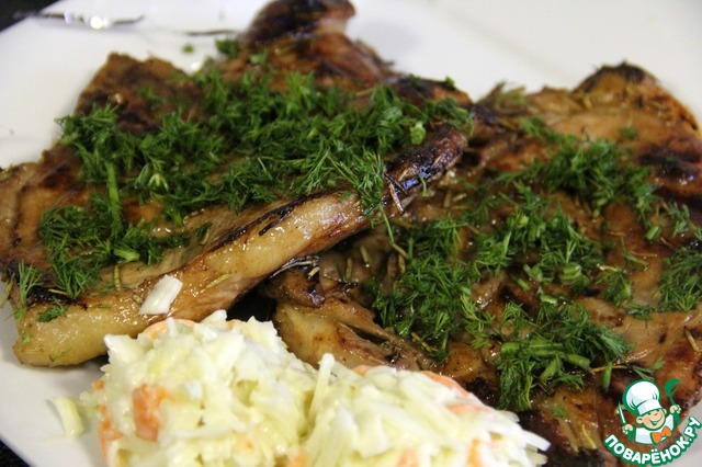 Pork chops grilled with rosemary