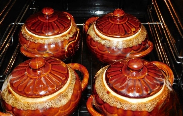 Hot with pickled cucumbers in pots