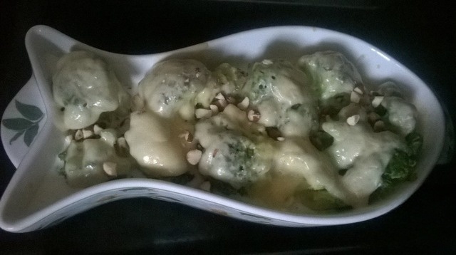 Broccoli topped with almonds